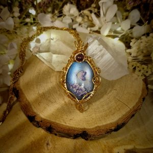 Pendentif doré papillons bleus et perle d'améthyste